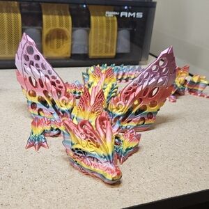 3D printed rainbow fae dragon